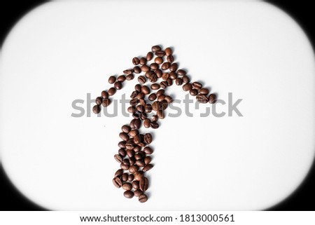 
Grains of coffee on a white background. Different shapes made from grains