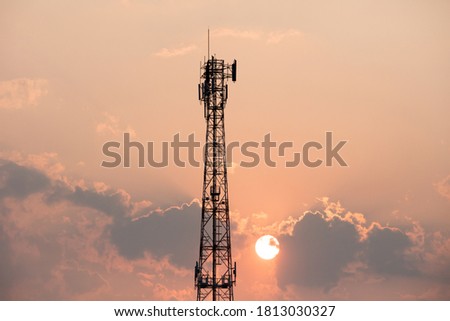 Antenna repeater tower  before the sunset. Royalty-Free Stock Photo #1813030327