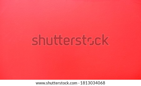 Red cement texture, concrete surface, photo for graphic design, wall or floor material, or insert text.