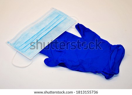 
medical mask and gloves on a white background