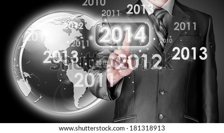 Businessman touching new year 2014