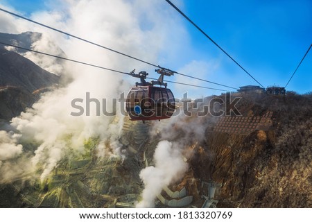 Hakone Ropeway at Owakudani Volcanic Valley with sulfur vents and hot springs in Hakone is a popular tourist destination near Japan's Tokyo. Royalty-Free Stock Photo #1813320769