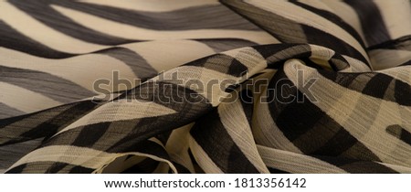 silk fabric with black and beige stripes, zebra skin in African style. For the designer, the sketch of the layout, the entourage of the decorator. Background texture collection