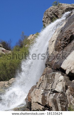 beautiful waterfall on mountain river