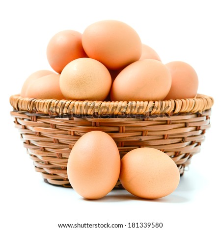 Eggs in basket isolated on white background Royalty-Free Stock Photo #181339580