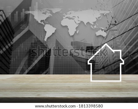 House icon with copy space on wooden table over black and white world map, city tower and skyscraper, Business real estate concept, Elements of this image furnished by NASA