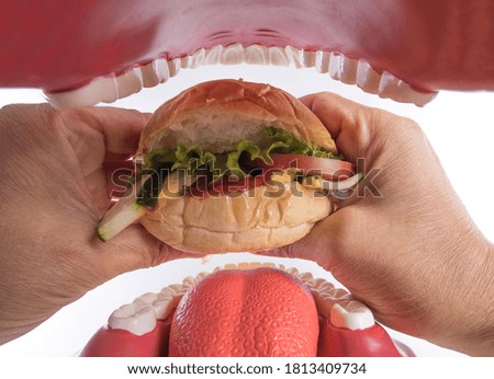 eating a big burger - view from the mouth