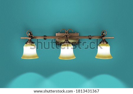 Antique Picture wall lamp on blue background