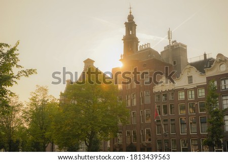 Sunset in a church and building of the streets of Amsterdam Holland