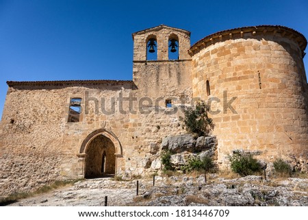 Facade of romanesque church "Ermita de San Frutos", abandoned hermitage built on top of a hill among cliffs, made of stone. No people on the picture. Hoces del Duratón (Duraton gorges), Segovia, Spain