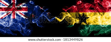 New Zealand vs Ghana, Ghanaian smoky mystic flags placed side by side. Thick colored silky abstract smoke flags