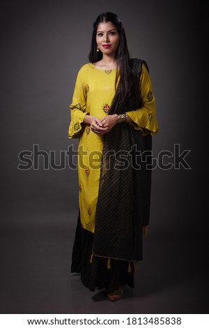 Young Indian Punjabi woman in simple traditional look