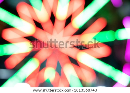 Blurred light with bokeh background of temple fair in Thailand.Abstract blurred circular bokeh background.