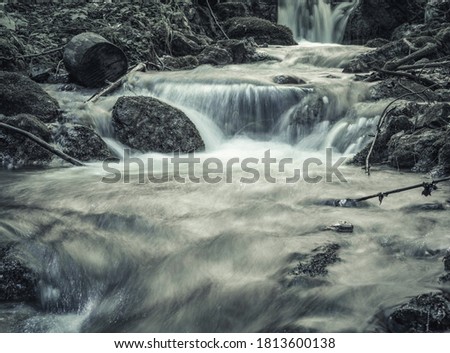 Picture of a mountain stream or creek flowing between rocks in Carpathian Mountains, Romania. Seven ladders canyon in Piatra Mare (Big Rock)mountains.
