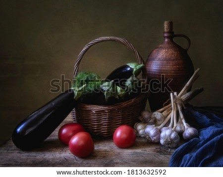 Still life with eggplants and tomatoes