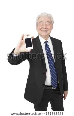 	Senior businessman holding smart phone	