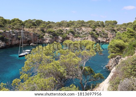 Turquoise waters, green vegetation and blue sky