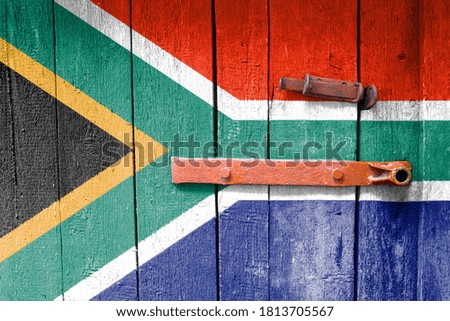 South Africa flag on texture. Template. Coronavirus pandemic. Countries are closed. Locks.