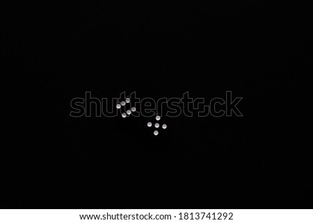 dice on a black background