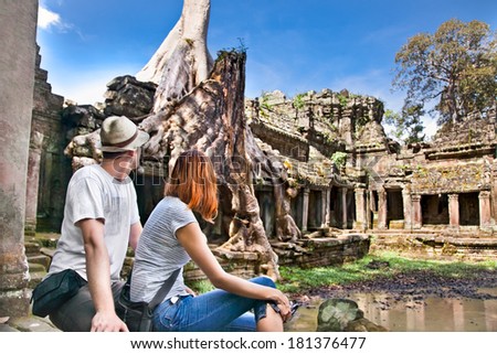Beautiful young couple at Preah Khan temple  in Angkor Wat, near Siem Reap, Cambodia.