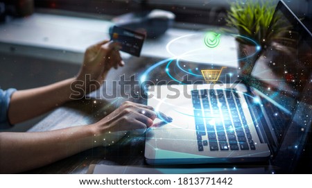 Modern money transaction transfer technology payment successful using laptop computer smart pay credit card billing info, online shopping ecommerce store ordering products, futuristic graphics icons Royalty-Free Stock Photo #1813771442