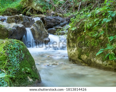 Picture of a mountain stream or creek flowing between rocks in Carpathian Mountains, Romania. Seven ladders canyon in Piatra Mare (Big Rock)mountains.