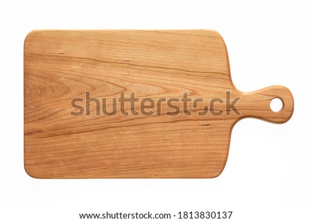 Handmade cherry wood cutting board Royalty-Free Stock Photo #1813830137