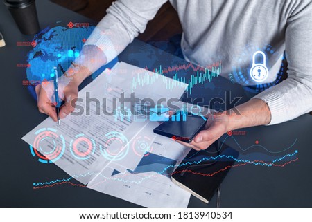 Double exposure of man signing contract with phone and business theme icon hologram. Concept of investment.