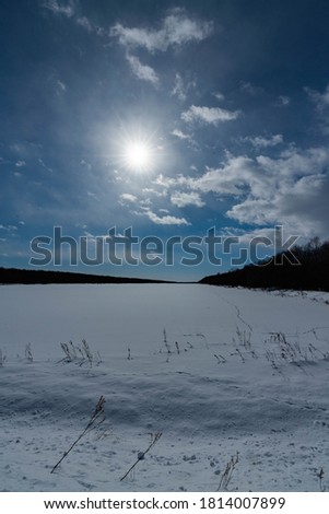 Snow, blue sky and sun Shiretoko scenery in winter