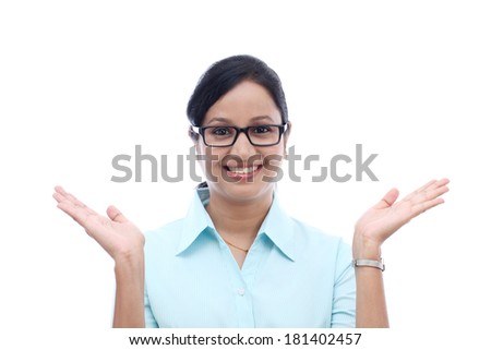 Excited young business woman against white background