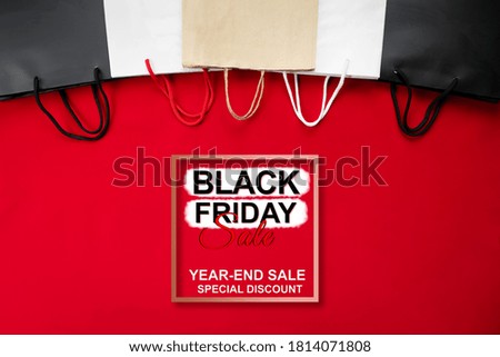 black friday sale, shopping bag on red background