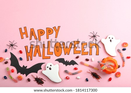 Halloween background with gingerbread and other sweets top view with place for text