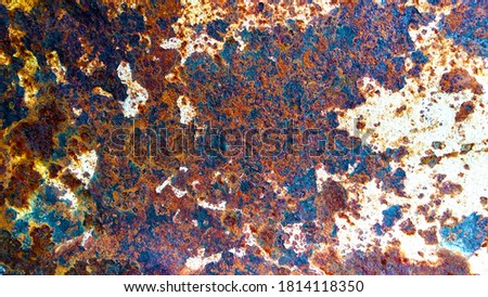 Rust and corrosion of old metal painted with white paint interspersed with turquoise spots .Corrosion of metals.Metal rust.Corrosive rust on old iron.Use as an illustration for your presentation.