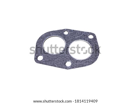 Gasket for front exhaust pipe of the car on an isolated white background. New spare parts.