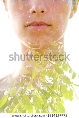 Young woman double exposure portrait with leaves