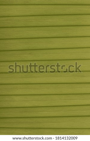 Close up of a colorful pleated fabric