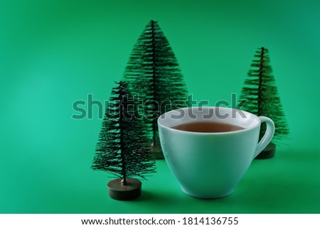 Green background with Christmas tree. Christmas background concept