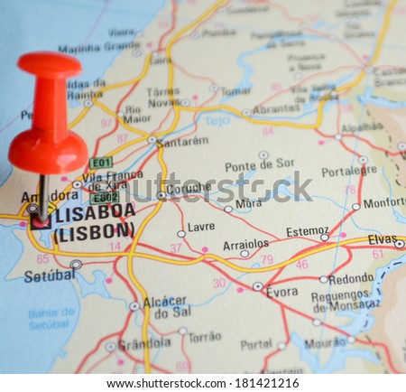 Close up of Lisbon map with red pin - Travel concept