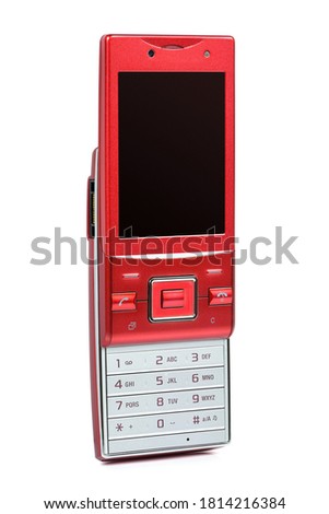 Red vintage slider phone isolated on white background with clipping path