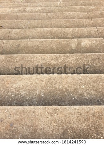 Steps of a public staircase from top to bottom horizontally.
