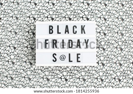 Black friday sale text on lightbox on on creative background. Creative Top view flat lay promotion composition