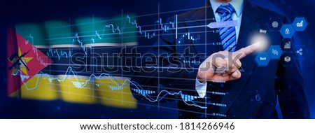 Businessman touching data analytics process system with KPI financial charts, dashboard of stock and marketing on virtual interface. With Mozambique flag in background.