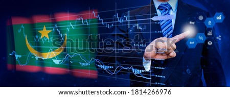 Businessman touching data analytics process system with KPI financial charts, dashboard of stock and marketing on virtual interface. With Mauritania flag in background.