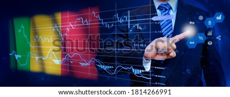 Businessman touching data analytics process system with KPI financial charts, dashboard of stock and marketing on virtual interface. With Mali flag in background.