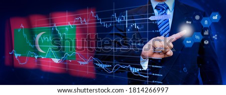 Businessman touching data analytics process system with KPI financial charts, dashboard of stock and marketing on virtual interface. With Maldives flag in background.