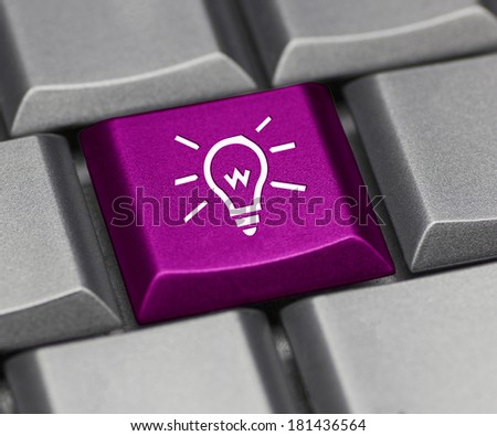 Computer key purple - light bulb
