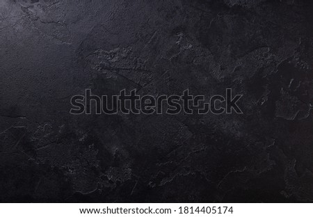 Natural black slate stone background pattern with high resolution. Top view. Copy space. Royalty-Free Stock Photo #1814405174
