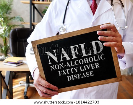 Non-alcoholic fatty liver disease NAFLD the doctor is holding a sign. Royalty-Free Stock Photo #1814422703