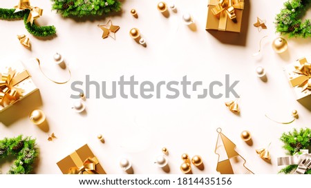 Merry Christmas Greeting Card and Composition of Festive Elements. New Year. Gift. Present. Decorations. Pine Branches. Social Media. Gold. Clean. Simple. Top View. 