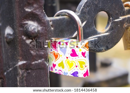 Love locker on a bridge in a canal in Amsterdam Holland